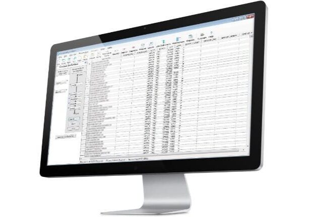 A computer monitor with an excel spreadsheet on it.